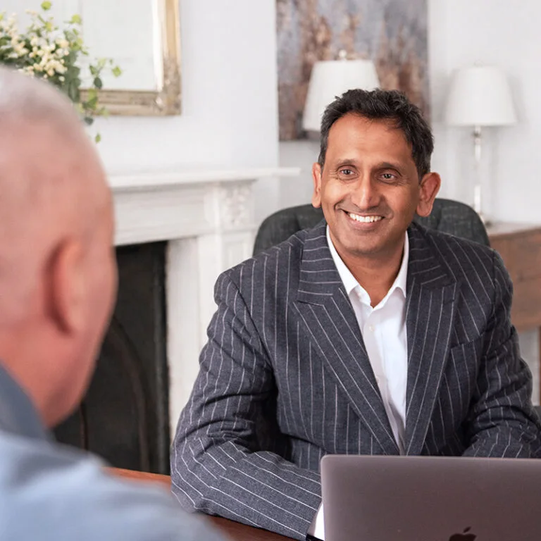 Professor Prasanna Sooriakumaran smiling during a prostate consultation in London